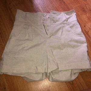 High Rise Khaki shorts with belt.